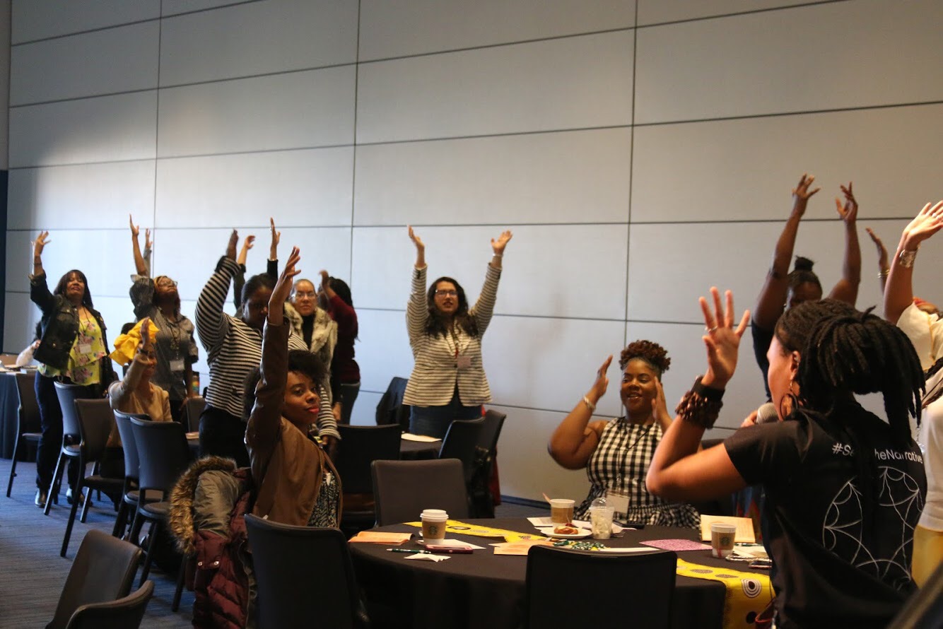 Conference attendees engaging during E's NWSA workshop